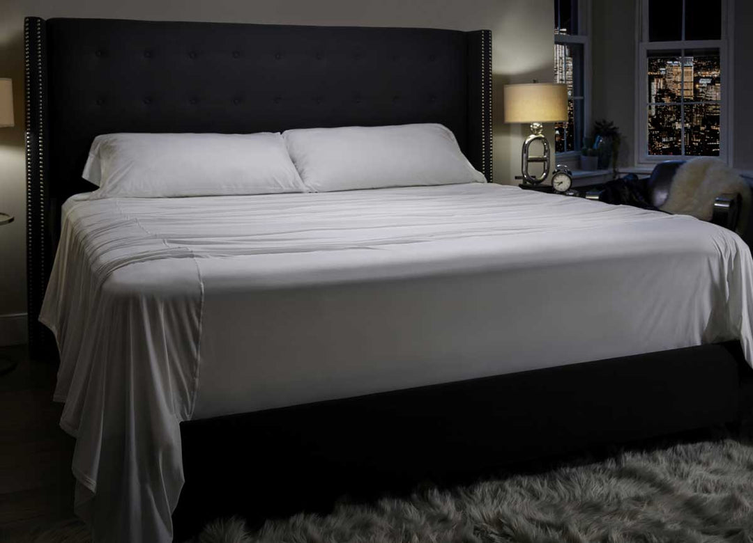 Midnight Label Sheet Set shown on bed #choose-your-color_porcelain