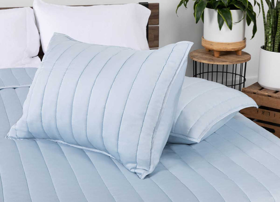 Arctic Coverlet Lifestyle with Sham Detail #choose-your-color_light-blue