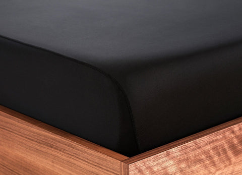 Original Performance Fitted Sheet on bed in Black #choose-your-color_black