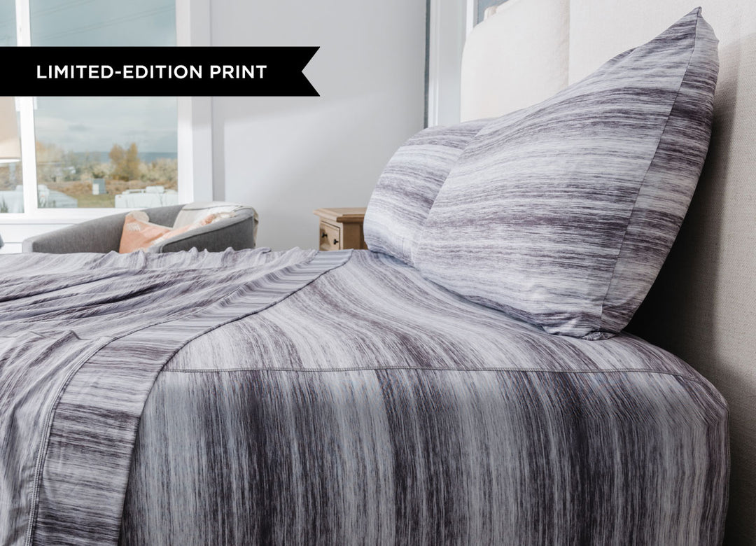 Original Performance Sheet Set on bed image Shown in Graphite Shadow Stripe #choose-your-color_graphite-shadow-stripe