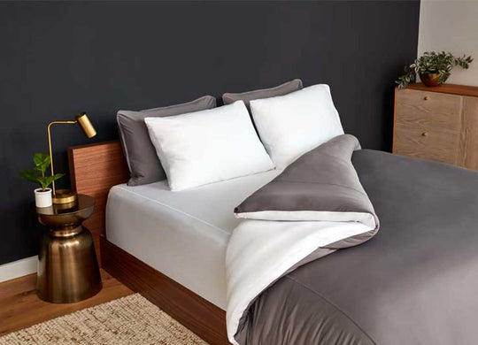 Studio Tech Bedding in Graphite and Bright White in room environment #choose-your-color_navy-graphite#choose-your-color_navy-graphite#choose-your-color_graphite-brtwhite