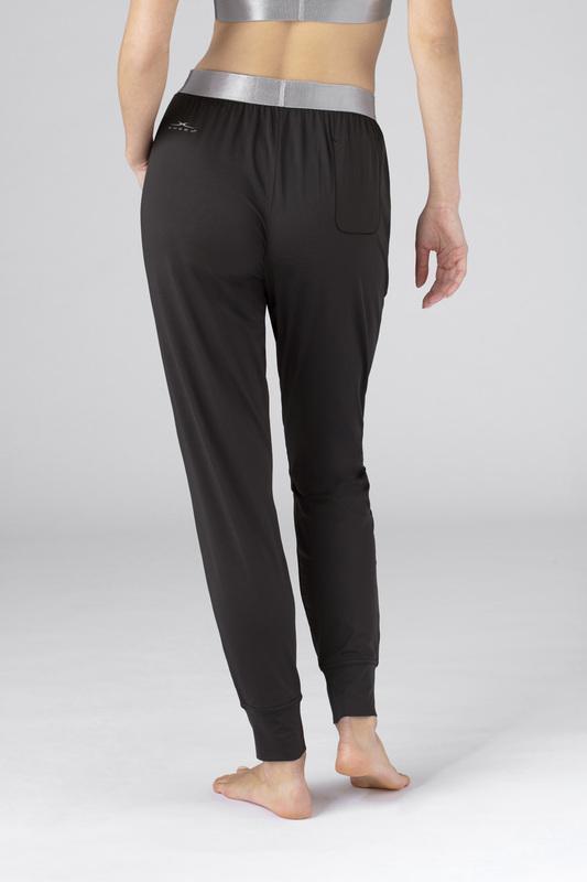 Model wearing SHEEX Women's Modern Jogger in black #choose-your-color_black